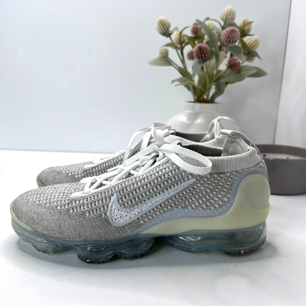 Nike Women’s Light Grey Knit Sneakers with Translucent Blue Sole
